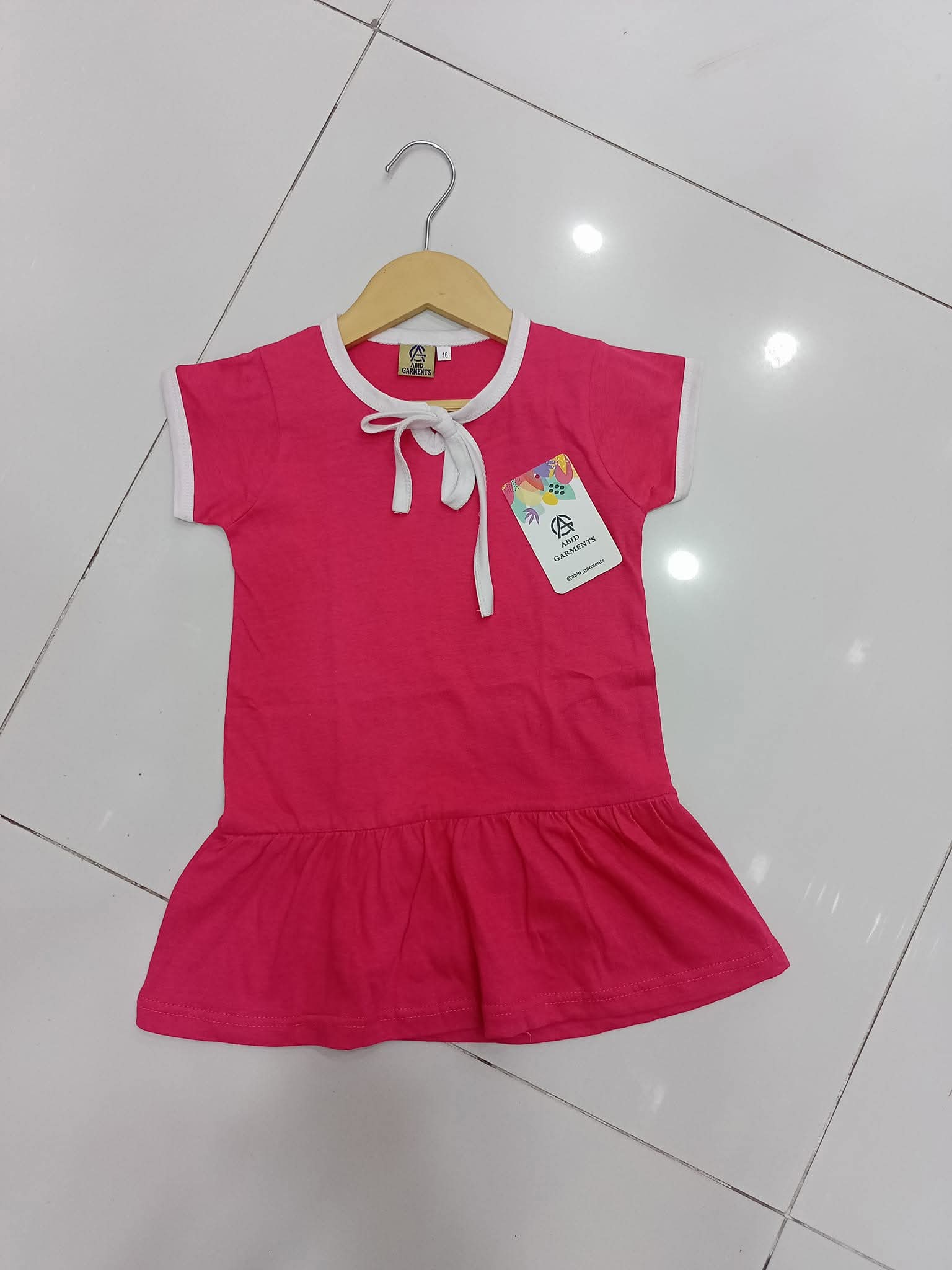Fuchsia pink drop-waist shirts